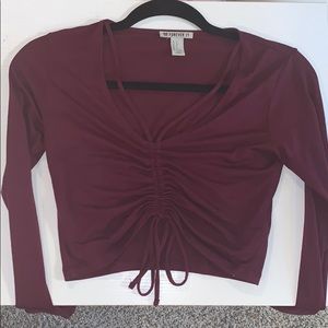 Long sleeved burgundy crop top